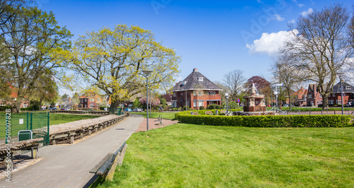 Panorama of a footpath in the park in Veendam, Netherlands photo