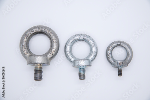 Eyebolt for lifting. Lifting bolt for lifting work. Various measures, isolated on white.