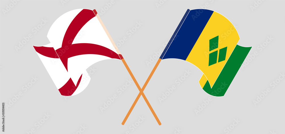 Crossed and waving flags of The State of Alabama and Saint Vincent and the Grenadines
