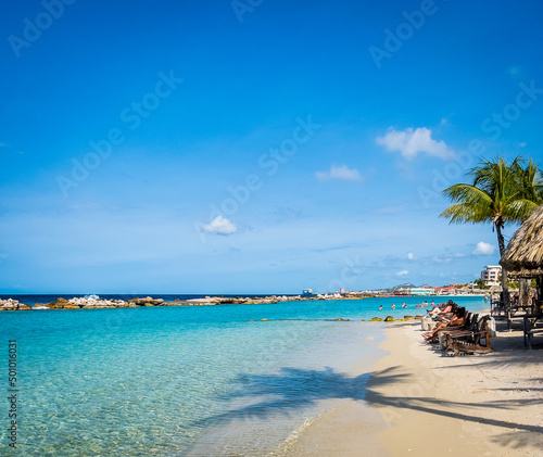 Bild auf Leinwand Sand, beach and break wall at Mambo Beach in Curacao