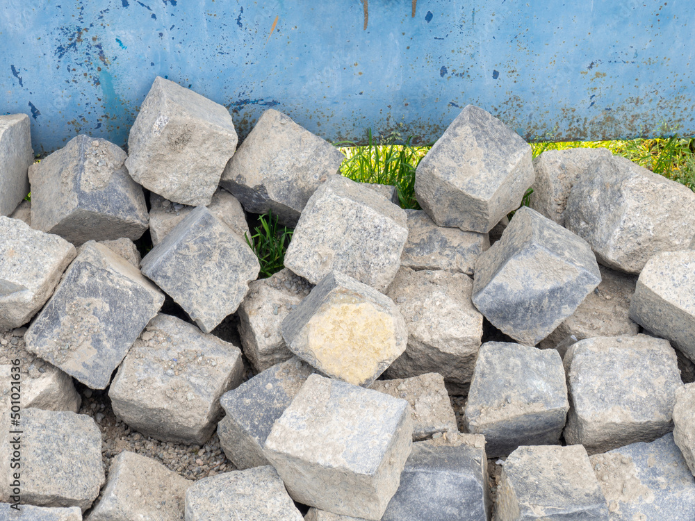 Cobblestone hill. Broken pavement stones. Building supplies. Cobblestone hill. Broken pavement stones. Building supplies.