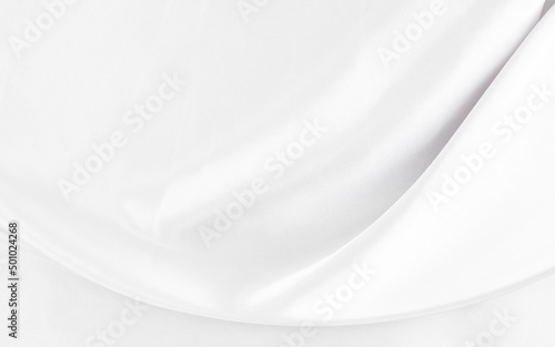 White gray satin texture that is white silver fabric silk background with beautiful soft blur pattern natural.