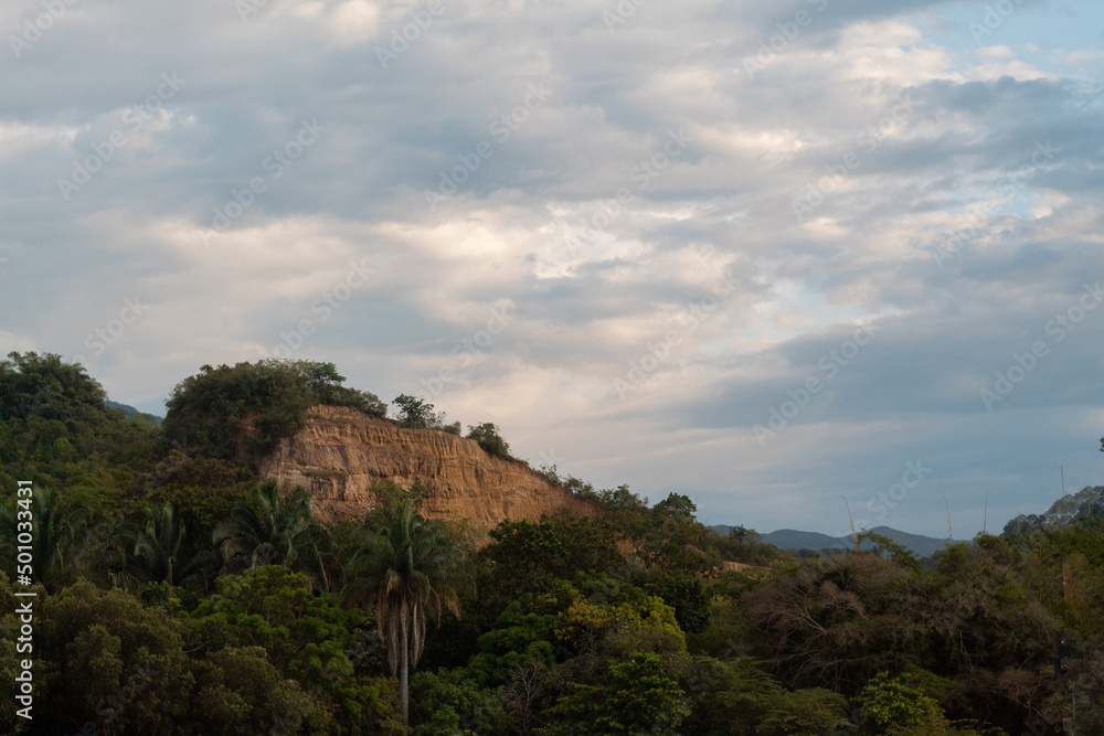 Beautiful landscape with mountains, a lot of vegetation and a sky with clouds