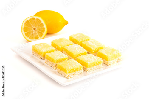 Batch of Lemon Bars on a Square Dish Isolated on a White Background