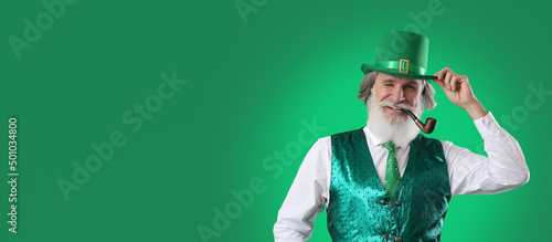 Senior man smoking pipe on ...