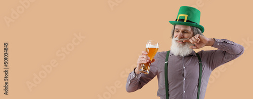 Senior man drinking beer on...