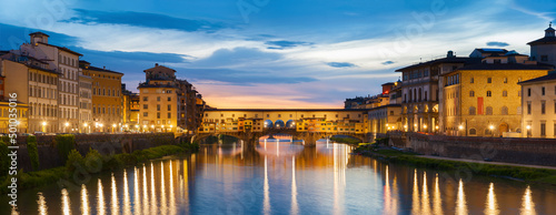 Ponte Vecchio - the bridge-market in the center of Florence, Tuscany, Italy at dusk