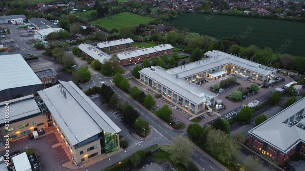 Reverse flight over a deserted business park at dusk Reverse flight over a deserted business park at dusk