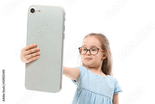 Cute little girl taking sel...
