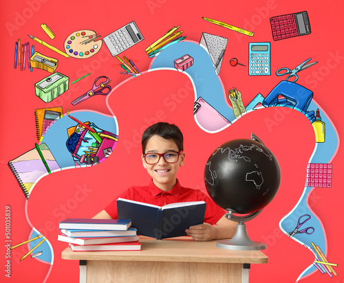 Cute little schoolboy with ...