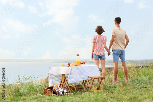 Happy young couple having r...