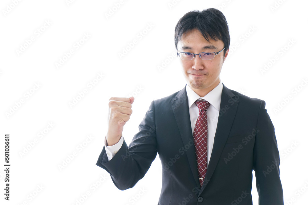 Businessman holding up fists Businessman holding up fists