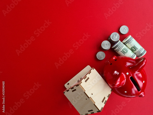 Piggy bank piggy bank and cash on red background top view