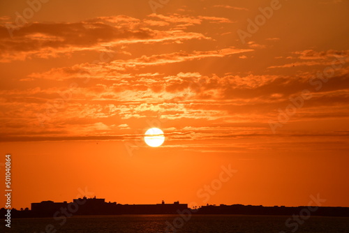 Orange sunset. Orange skies at the seaside