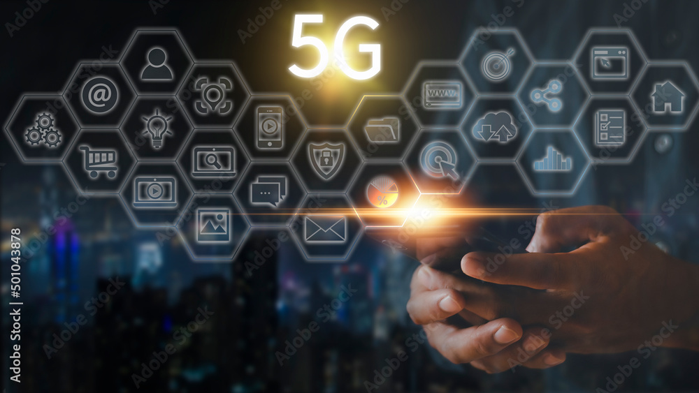 Hand of business man hold mobilephone connect network 5G with icon concept, technology network wireless systems and internet of things, new technologies coming up in the future. Network connection 5G Hand of business man hold mobilephone connect network 5G with icon concept, technology network wireless systems and internet of things, new technologies coming up in the future. Network connection 5G