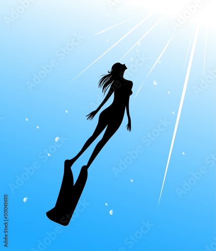 海に潜る女性