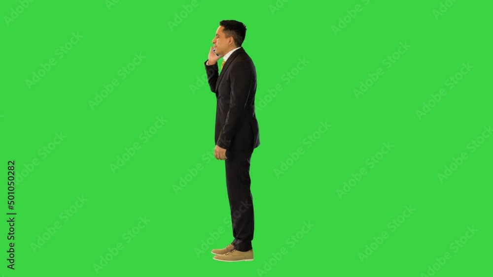 Successful hispanic businessman talk on smart phone call conversation happy smiling hand gesturing on a Green Screen, Chroma Key. Successful hispanic businessman talk on smart phone call conversation happy smiling hand gesturing on a Green Screen, Chroma Key.