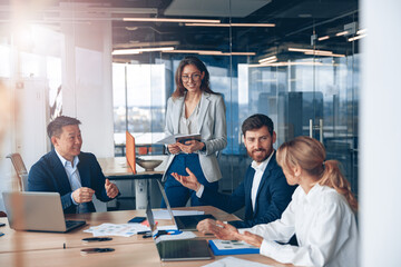 A group of business people partners during a set team meeting in the modern office.High quality 