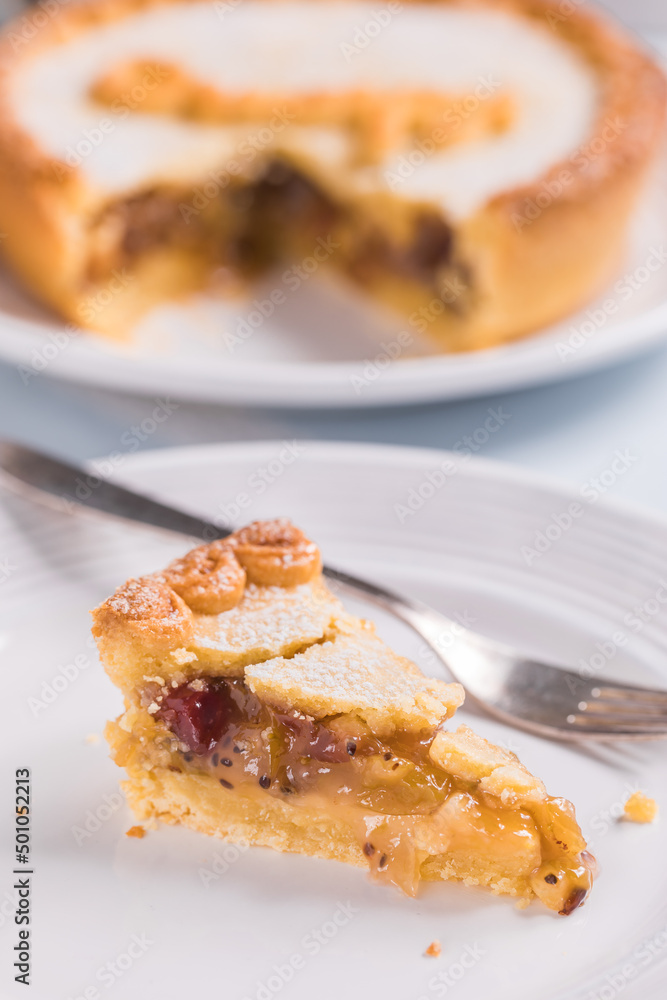 Gooseberry pie with Grumpy sign on it, popular dish from fairytale Snow white and seven dwarfs Gooseberry pie with Grumpy sign on it, popular dish from fairytale Snow white and seven dwarfs