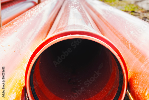 Canvas-taulu Orange sewer pipes at the construction site