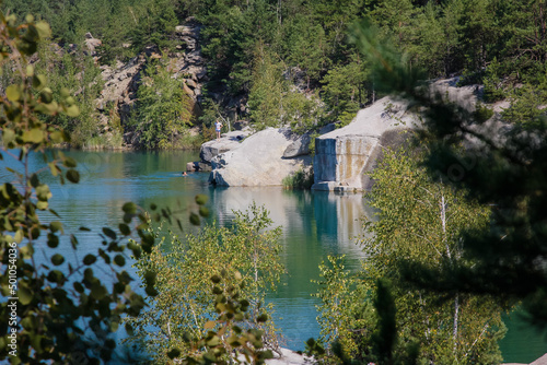 Ukraine Korostyshev granite quarry Blue lake in the forest photo