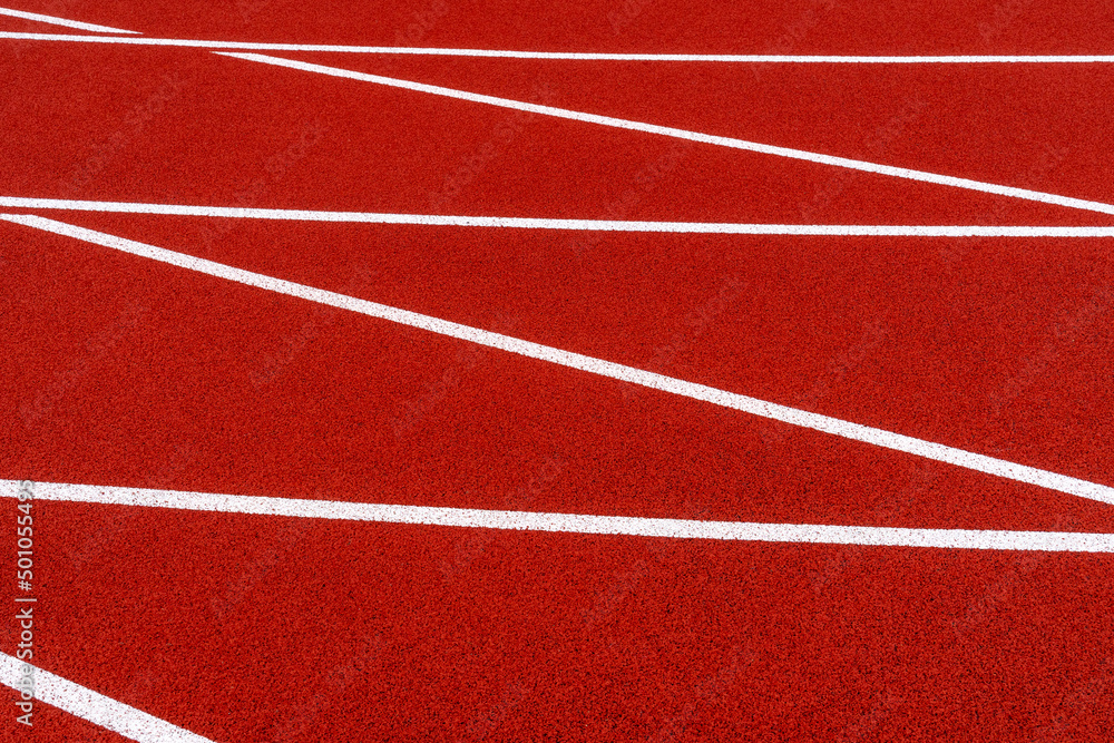 Red running track white lines