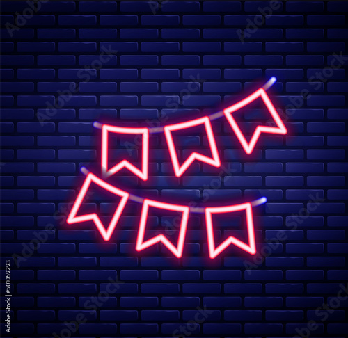 Glowing neon line Carnival garland with flags icon isolated on brick wall background. Party pennants for birthday celebration, festival decoration. Colorful outline concept. Vector