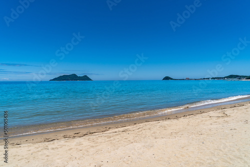 Sand beach and waves in countryside of  Japan. © w108av22