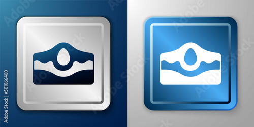 White Acne icon isolated on blue and grey background. Inflamed pimple on the skin. The sebum in the clogged pore promotes the growth of a bacteria. Silver and blue square button. Vector