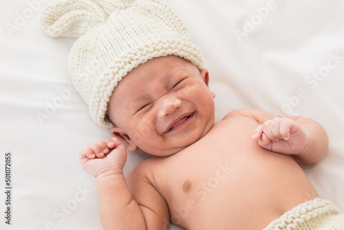 Photos Adorable infant 0-1month fussy screaming unhappy angry