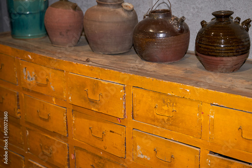 Herbal medicine cabinet and Chinese medicine pot in a Chinese herbal medicine store