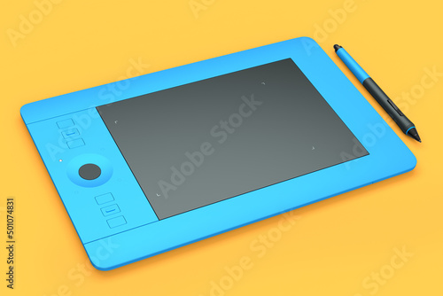 Graphic tablet and pen for illustrators, designers and photographers on orange