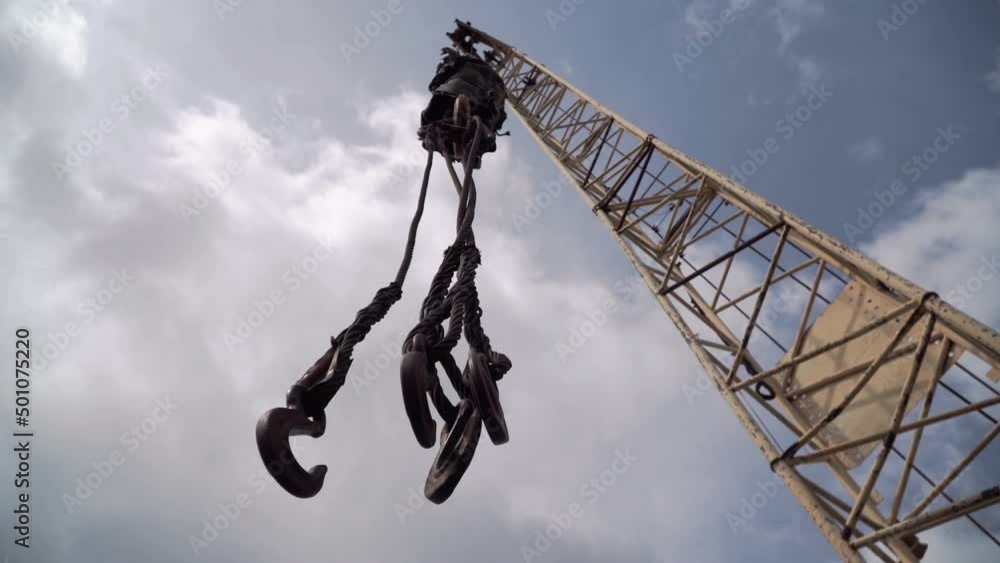 Four hooks. Old faucet. Cargo handling devices. Loading and unloading