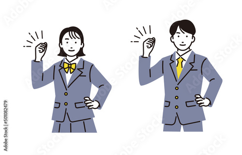ガッツポーズをする高校生の男女