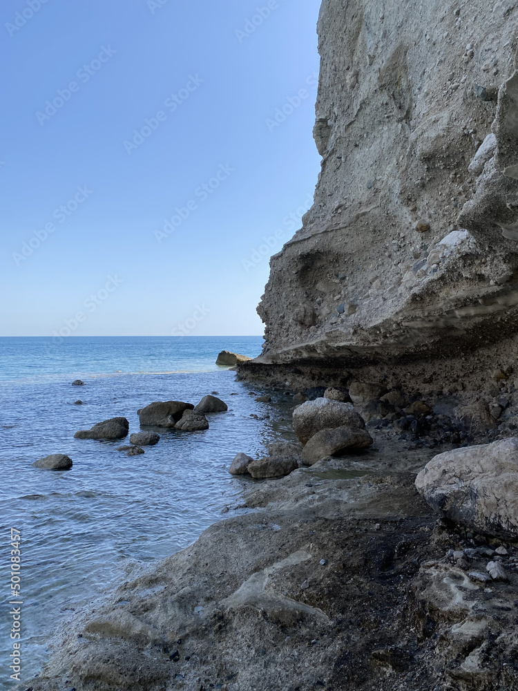 Rocks that rise out of the sea ,blue sky, blue sea. beautiful views of rocks and the sea in beach