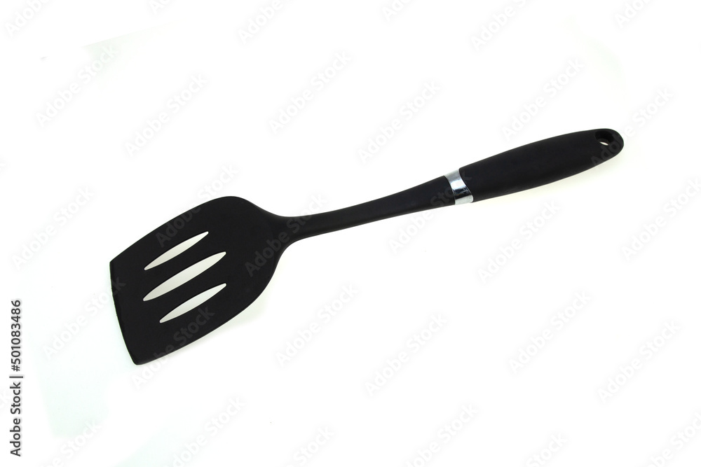 Black plastic turner placed on a white background. Black plastic turner placed on a white background.