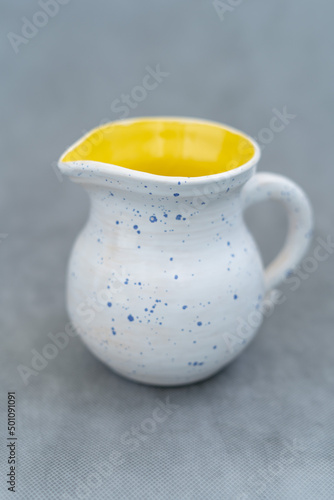 Ceramics, a ceramic product made with their own hands, made on a potter's wheel, jug, mug, clay, glaze.