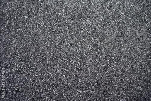 The blur of the asphalt road