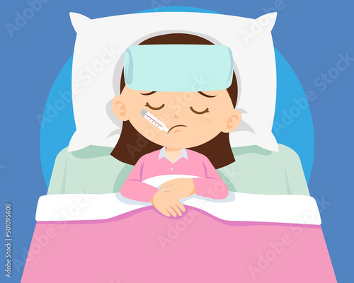 Sick child girl in bed with thermometer in mouth