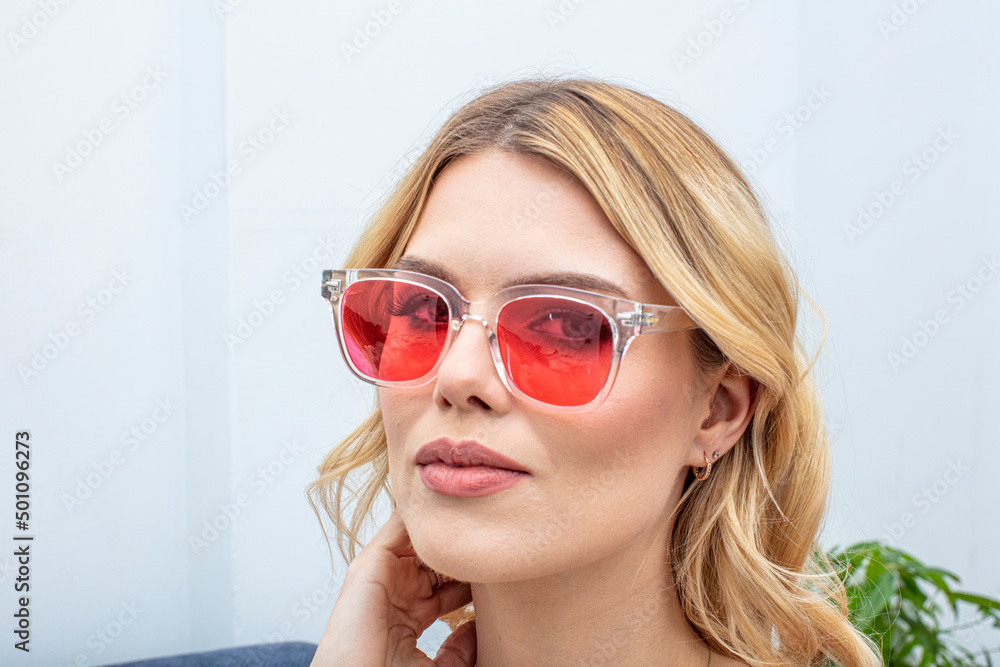 Sexy blonde lady with glasses. Beauty portrait. Attractive young woman in glasses with bright makeup. Optics style. Cosmetics and make-up. Sexy blonde lady with glasses. Beauty portrait. Attractive young woman in glasses with bright makeup. Optics style. Cosmetics and make-up.