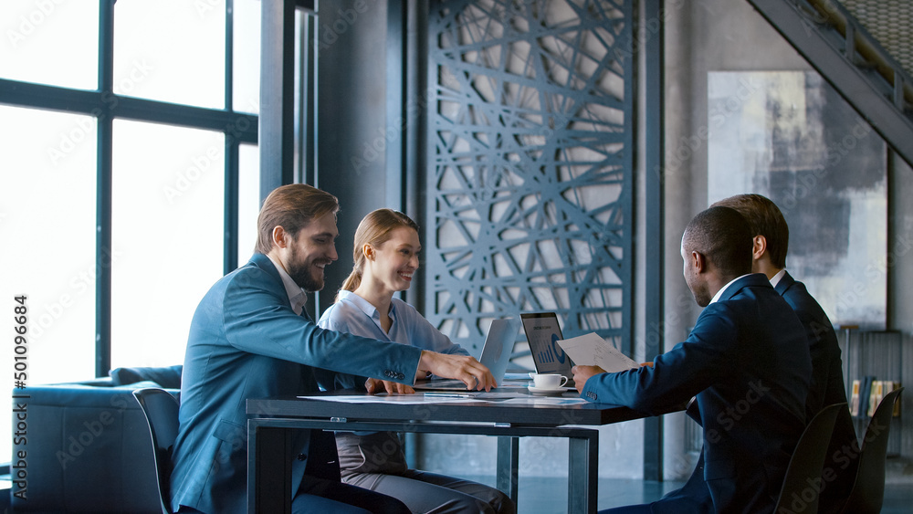 Businessmen at a meeting to discuss a working project in the office