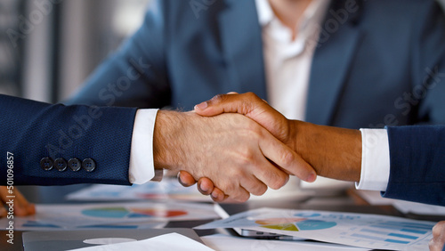 Wallpaper Mural Business handshake: two colleagues shaking hands at a business meeting in the office Torontodigital.ca