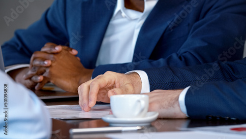 Office concept: two men actively discussing a business project
