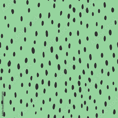 Abstract hand drown polka dots background. Green dotted seamless pattern with black circles. Template design for invitation, poster, card, flyer, textile, fabric