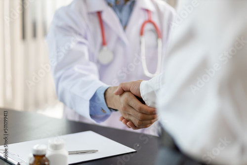 Handshake. The concept of medical cooperation and health consulting.