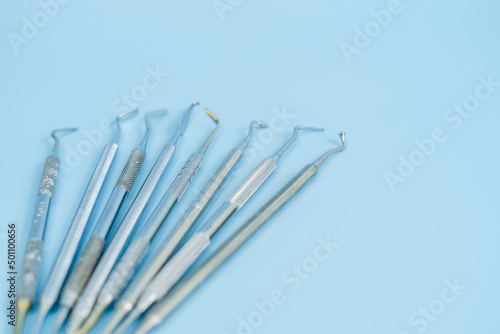 Dentist tool set. Teethcare  dental health concept. Blue background top view copy space