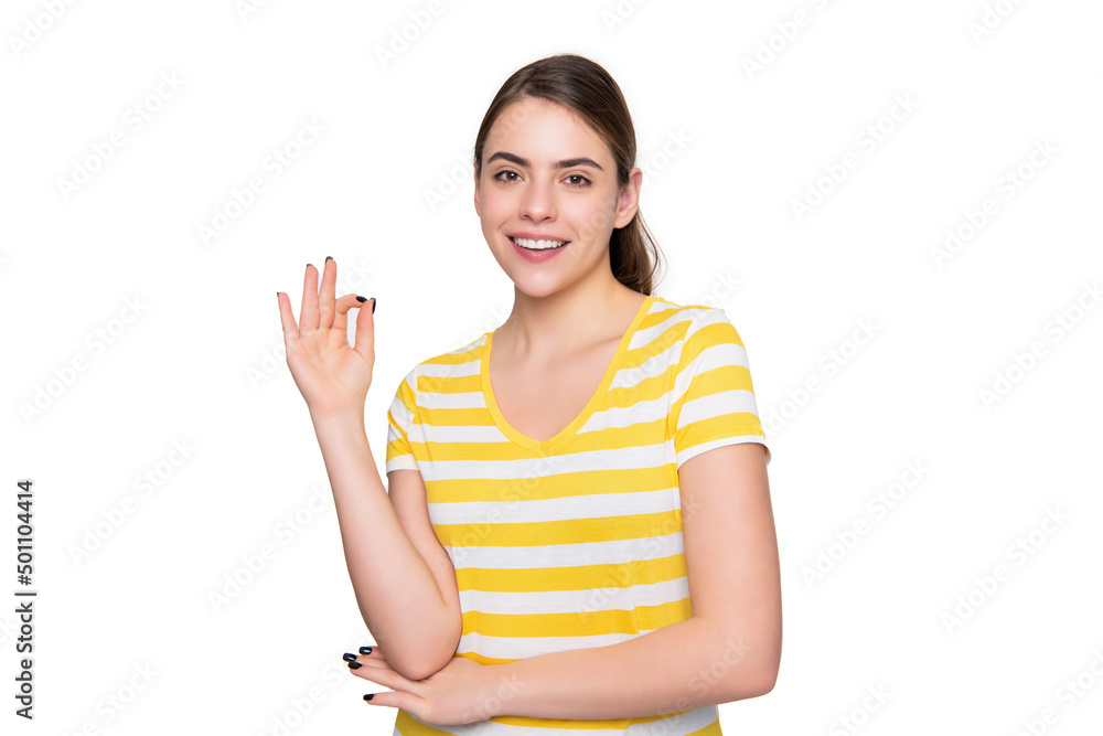 positive young girl in summer striped tshirt isolated on white background. ok positive young girl in summer striped tshirt isolated on white background. ok