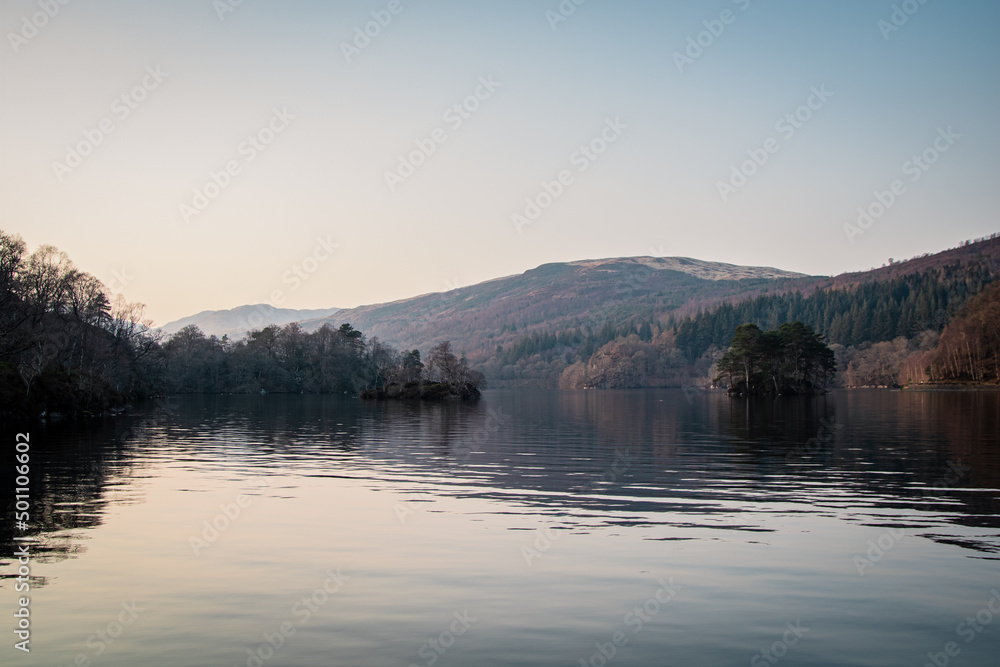A landscape photograph looking across the waters of Loch Lomond in Scotland.