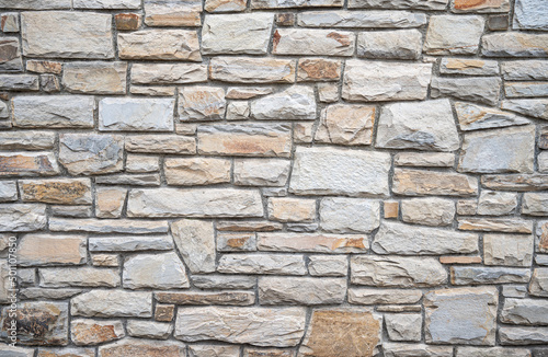 light-colored natural stone wall