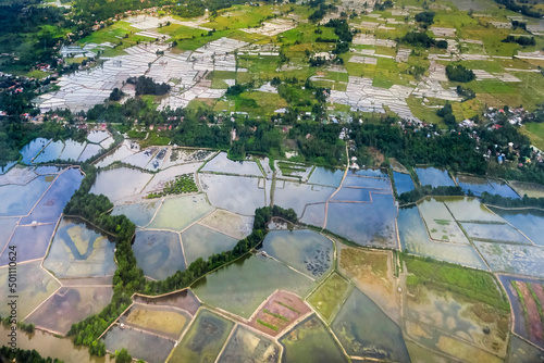 Rice fields and fish ponds on the Gulf of Boni estuarine coast near South Sulawesi's second city, Palopo, Luwu, South Sulawesi, Indonesia